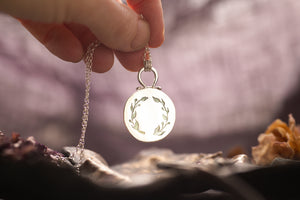 OOAK round Prehnite locket with wreath design