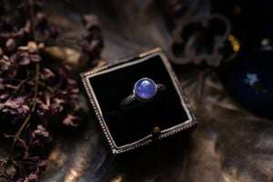 Tanzanite ring with ornate band