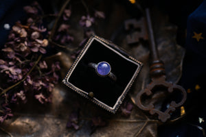Tanzanite ring with ornate band