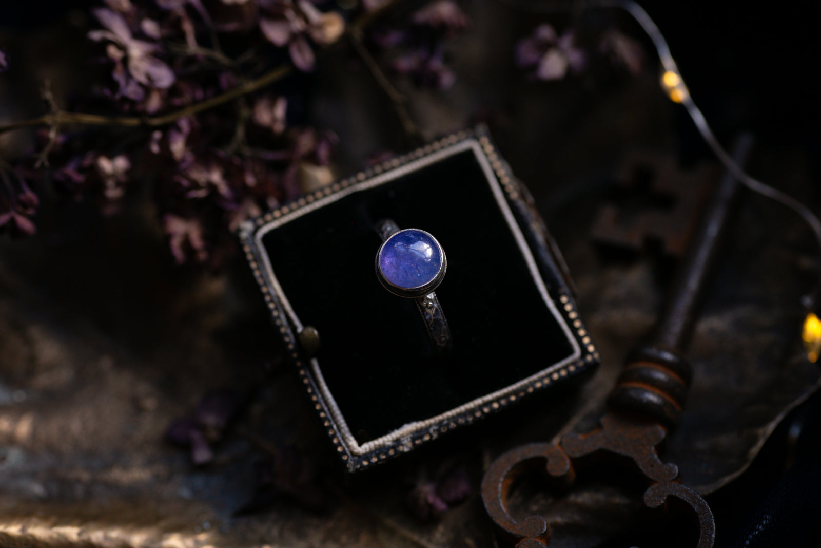 Tanzanite ring with ornate band