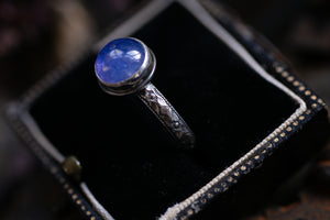 Tanzanite ring with ornate band