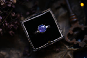 Tanzanite ring with ornate band