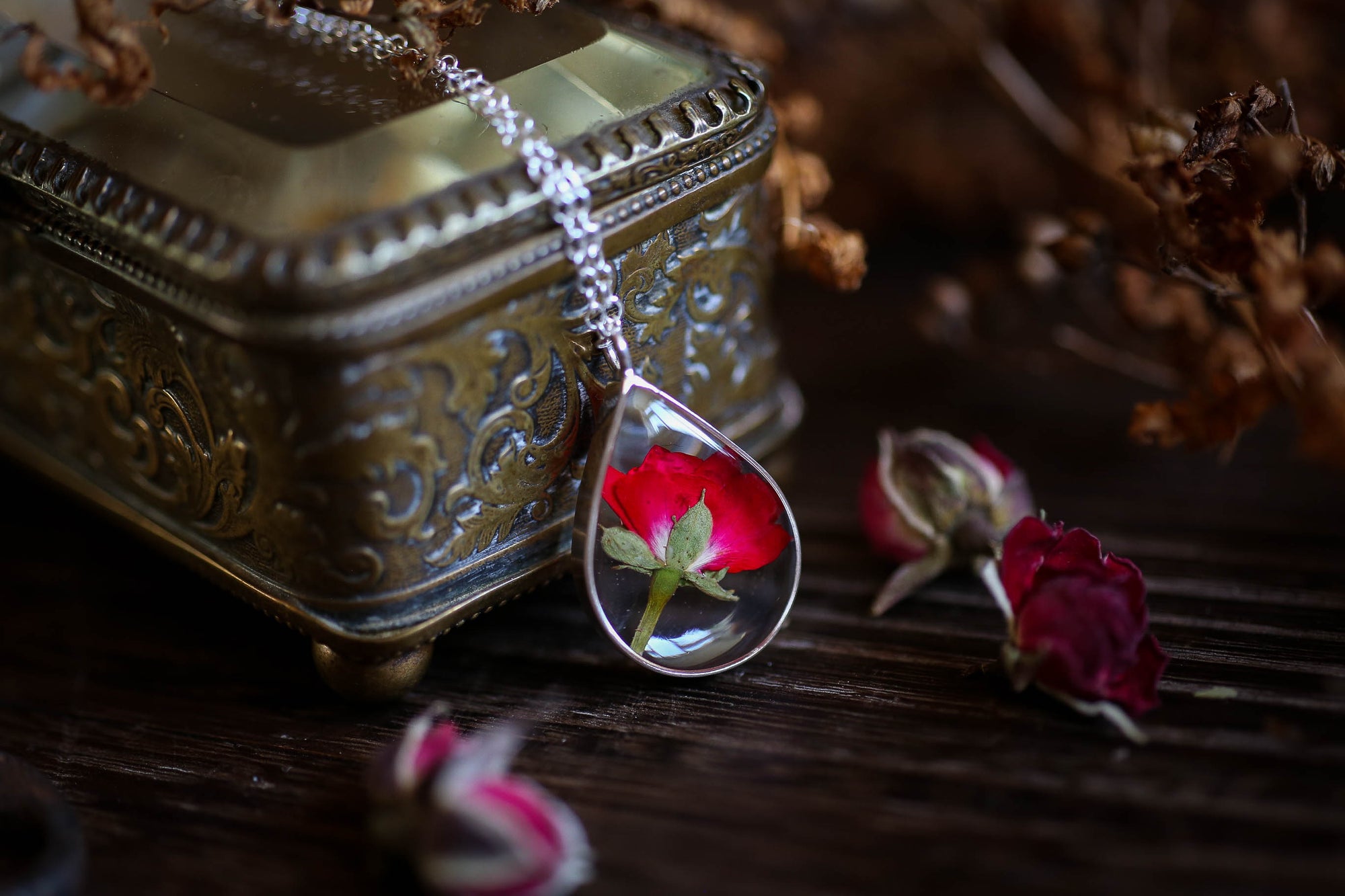 Sterling silver rosebud locket necklace