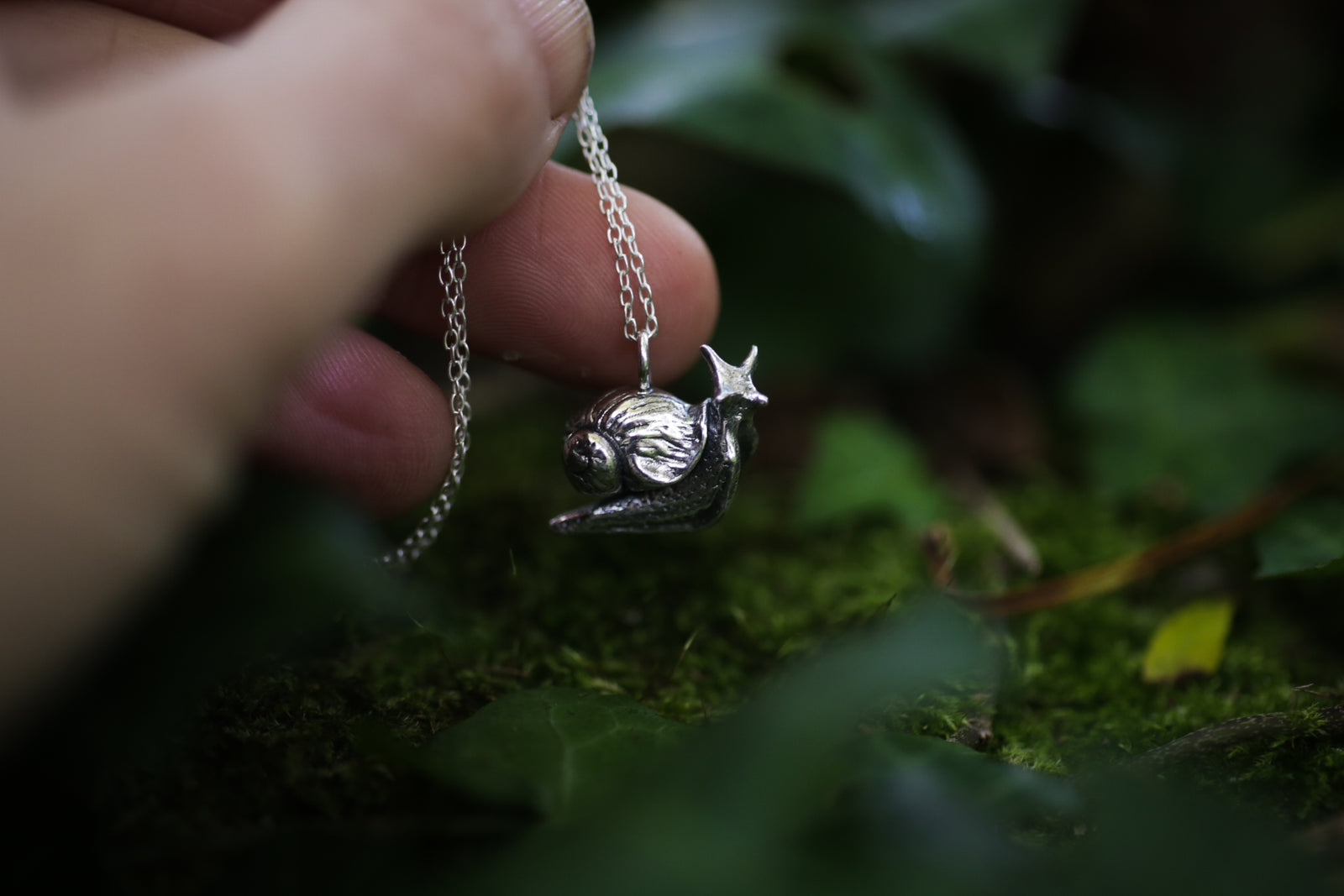 Miniature silver snail necklace
