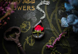 Sterling silver rosebud locket necklace